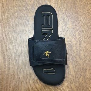 AND1 Black and Gold Slippers (size 9)